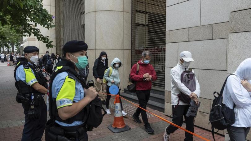 Security around the Hong Kong court where democrats were found guilty in a landmark case back in May. 