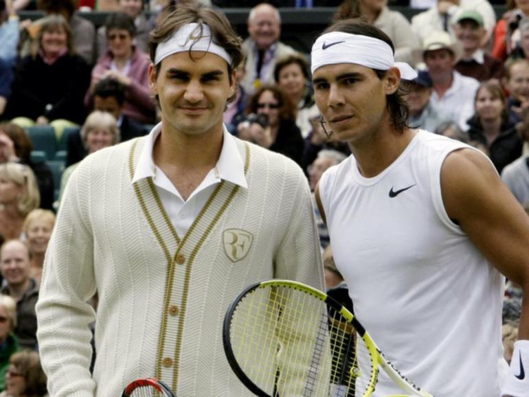 Roger Federer (l) and Rafa Nadal (r) pose before the start of the Wimbledon men's final in 2008. 