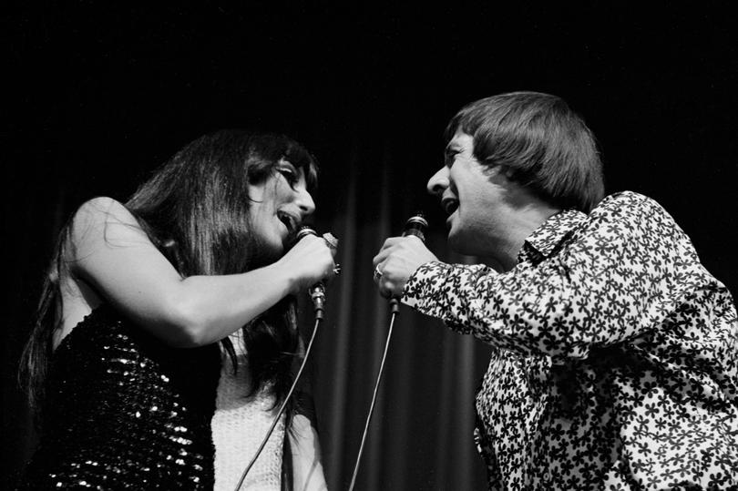 Sonny and Cher singing together in Paris in 1966.