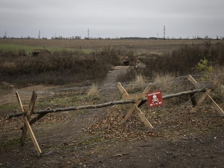 A sign warns of land mines in Ukraine's Kherson region in 2023. 