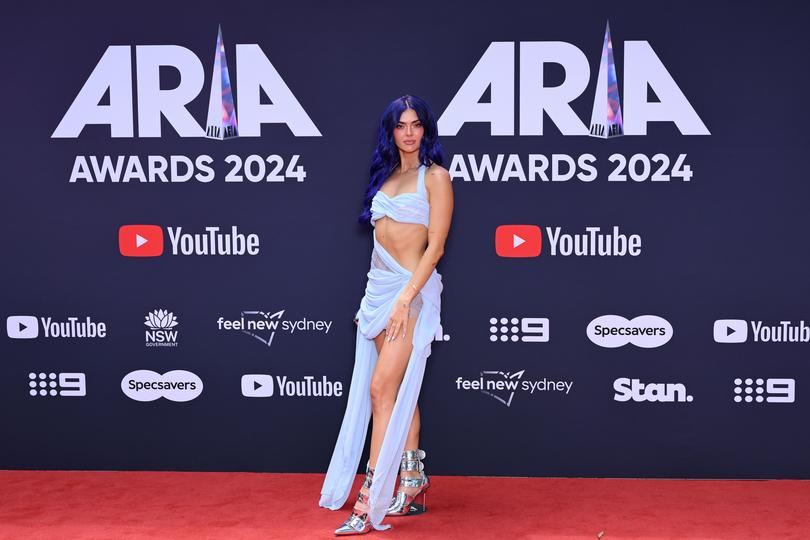 Australian singer Charley attends the red carpet during the 38th ARIA Music Awards.