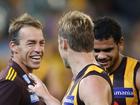 Alastair Clarkson, Sam Mitchell and Cyril Rioli in 2013. 