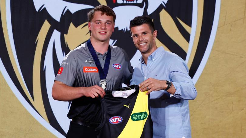 Richmond have selected Victorian midfield gun Sam Lalor with the first pick in the 2024 AFL Draft, with his jumper presented by triple premiership captain Trent Cotchin. 