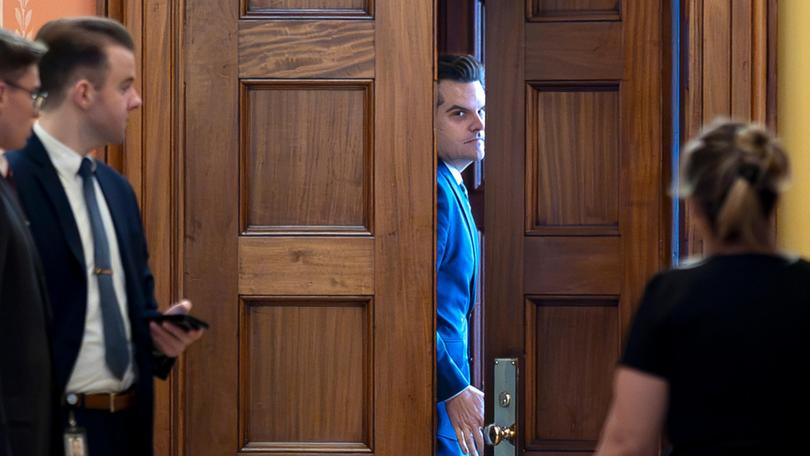 President-elect Donald Trump's nominee to be attorney general, former Rep. Matt Gaetz, R-Fla., closes a door to a private meeting with Vice President-elect JD Vance.