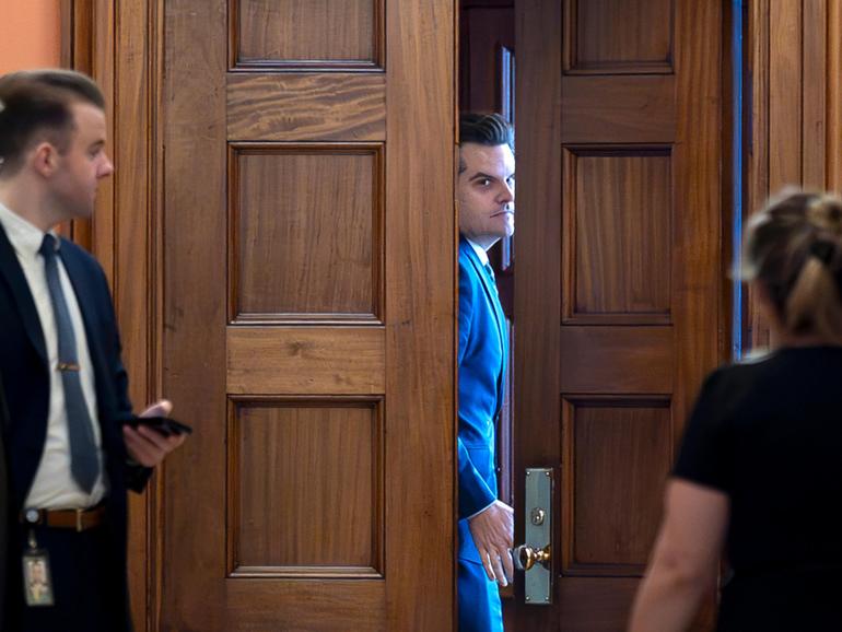 President-elect Donald Trump's nominee to be attorney general, former Rep. Matt Gaetz, R-Fla., closes a door to a private meeting with Vice President-elect JD Vance.