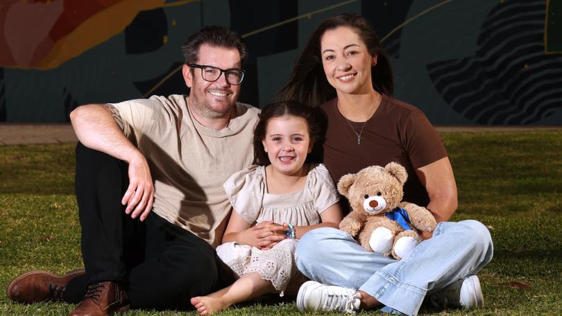 Parents Tyler and Kelly Binnington with their daughter Ella at the Harry Perkins Institute of Medical Research.