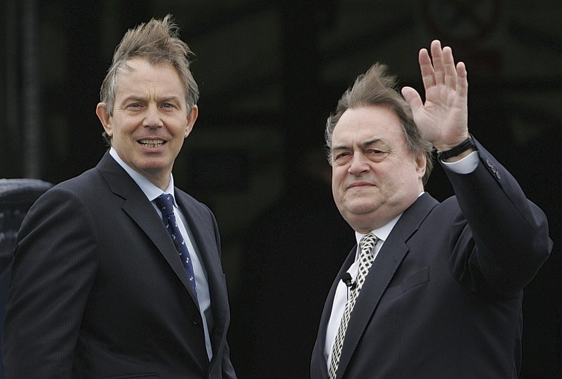 Prime Minister Tony Blair, left, turns towards the media with his Deputy John Prescott, in 2005.