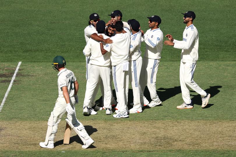 Jasprit Bumrah of India celebrates after taking the wicket of Nathan McSweeney.