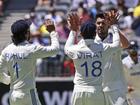 Harshit Rana celebrates one of his three wickets.