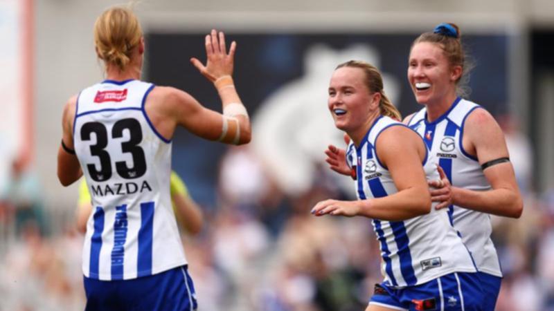 Kangaroos Kate Shierlaw, Vikki Wall and Tahlia Randall celebrate a goal in the win over Port. (Morgan Hancock/AAP PHOTOS)