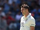 Pat Cummins of Australia reacts during day two of the First Test match.