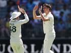 Pat Cummins celebrates the wicket of Dhruv Jurel.