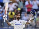 India's Virat Kohli celebrates his century on the third day of the first cricket test between Australia and India in Perth, Australia, Sunday, Nov. 24, 2024. (AP Photo/Trevor Collens)