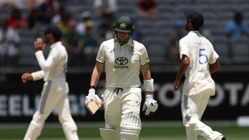 Steve Smith off after he was dismissed by Mohammed Siraj.