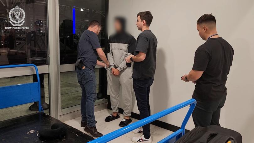 The man was arrested at Sydney Airport.