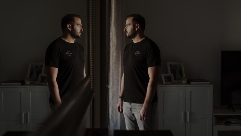 Ari Krauss, a reservist in Israel’s elite Golani Brigade, at home this month in Tel Aviv. MUST CREDIT: Ofir Berman for The Washington Post