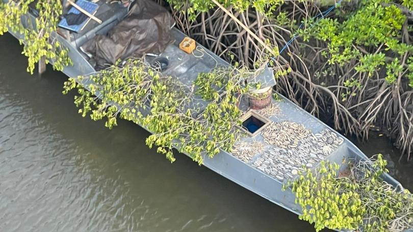 An Indonesian fishing boat hidden in mangroves near the remote community of Maningrida.