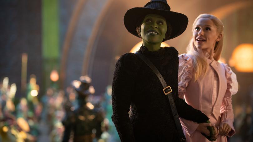 L to R: Cynthia Erivo is Elphaba and Ariana Grande is Glinda in WICKED, directed by Jon M. Chu