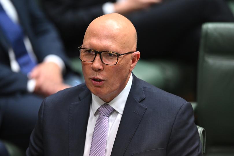 Australian Opposition Leader Peter Dutton reacts during House of Representatives Question Time at Parliament House in Canberra, Tuesday, November 19, 2024. (AAP Image/Lukas Coch) NO ARCHIVING