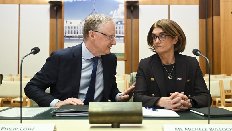 Former RBA Governor Philip Lowe (left) speaks to current Governor Michele Bullock in 2023.