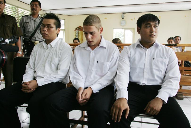 Some of the BALI NINE appearing at the Denpasar District court on charges related to trafficking heroin. Seen here are (l-r) Si Yi Chen , Matthew Norman and Thac Duc Than Nguyen sit in court waiting for the judges. Bali nine