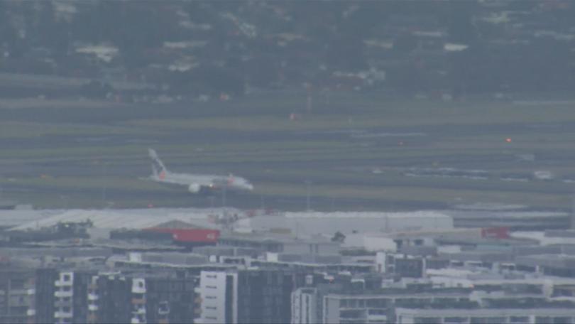 The plane landed back at Sydney airport about 5pm.