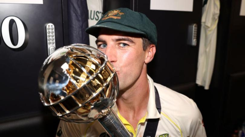 Pat Cummins celebrates after Australia’s victory over India in the World Test Championship final in 2023.