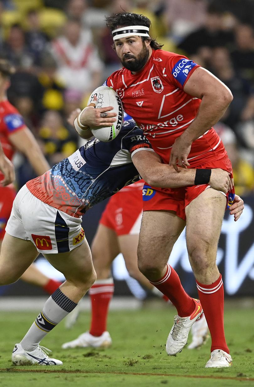 TOWNSVILLE, AUSTRALIA - JUNE 10:  Aaron Woods of the Dragons is tackled during the round 14 NRL match between the North Queensland Cowboys and the St George Illawarra Dragons at Qld Country Bank Stadium, on June 10, 2022, in Townsville, Australia. (Photo by Ian Hitchcock/Getty Images)