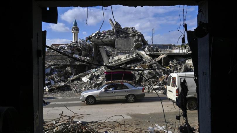 Displaced Lebanese residents return to the rubble of their homes after a ceasefire was agreed.