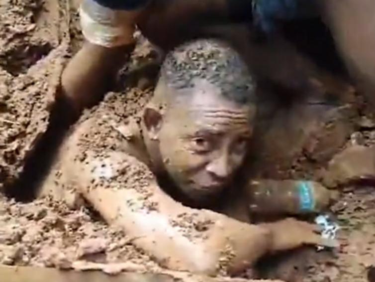 Adriano dos Santos spent seven and a half hours trapped under the rubble after his home was crushed by a landslide that also destroyed his neighbour’s home in the northeast Brazilian city of Salvador on Wednesday