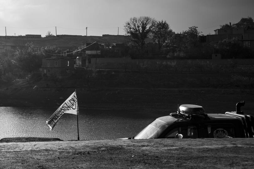 A Taliban police vehicle is seen at Qargha Lake, a park area in western Kabul where women are now banned from entering. MUST CREDIT: Carolyn Van Houten/The Washington Post