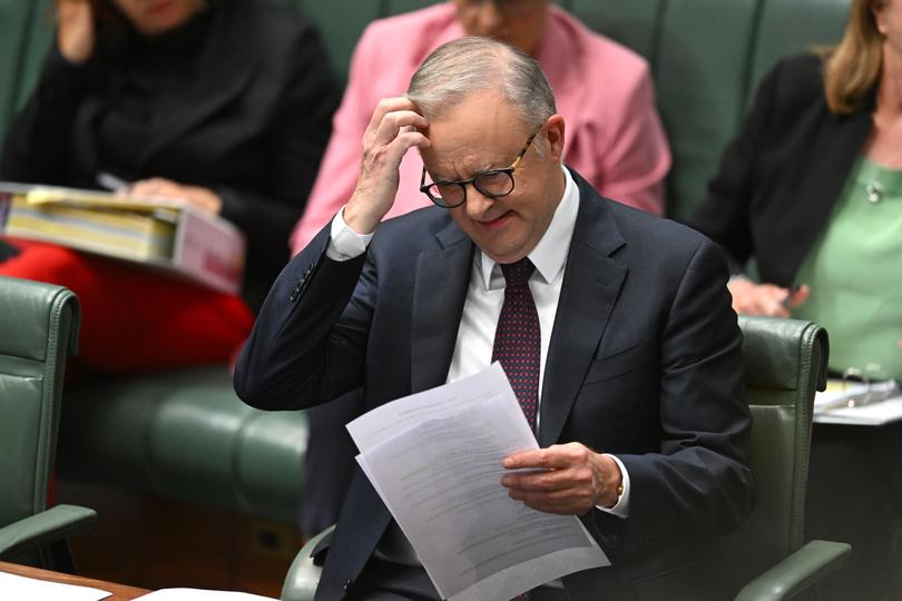 Australian Prime Minister Anthony Albanese reacts during House of Representatives Question Time at Parliament House in Canberra, Thursday, November 28, 2024. (AAP Image/Lukas Coch) NO ARCHIVING