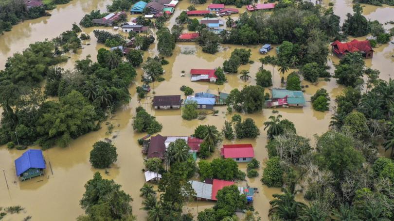 More than 80,000 people have been evacuated to temporary shelters due to flooding across Malaysia.