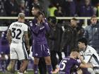 Emotional Fiorentina and Inter players comfort each other after Edoardo Bove's collapse on the pitch.