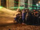 Police use water cannons to disperse Georgian opposition supporters protesting in front of the Parliament building in Tbilisi, Georgia, 01 December 2024. 