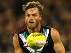 The late John McCarthy played 21 games in the No.35 jumper at Port Adelaide.