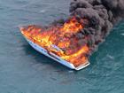 Two people have escaped a burning boat off Cottesloe on Monday.