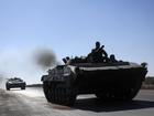 Advancing insurgents appeared to catch the Syrian military by surprise in Aleppo and other areas. (AP PHOTO)