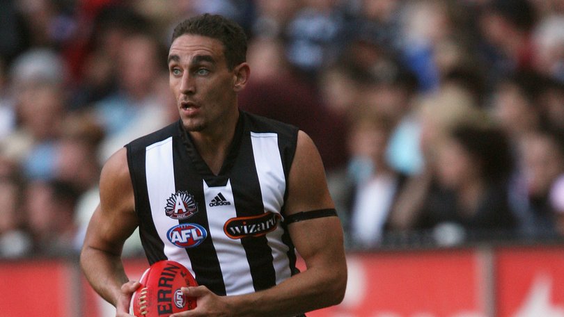 Shannon Cox in action against the Essendon Bombers during his playing days.