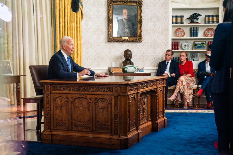 Biden delivers remarks in the Oval Office in July, joined by Hunter Biden, at right. (MUST CREDIT: Demetrius Freeman/The Washington Post) 