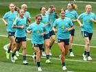 The Matildas jog a lap during a training session at AAMI Park on Tuesday.