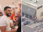 Thousands of people have lined up in the heat of Western Sydney for free groceries, thanks to Melbourne billionaire Adrian Portelli.