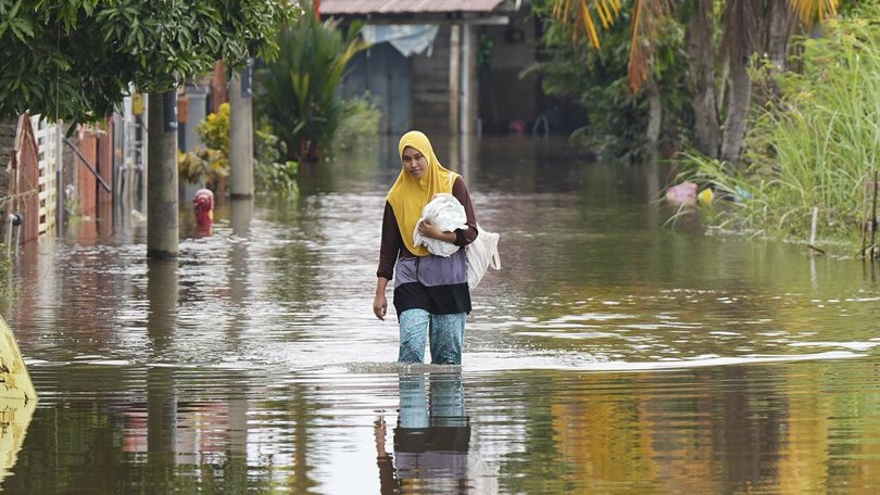 Heavy rain battered Malaysia's northeastern state of Kelantan and neighbouring Terengganu. 