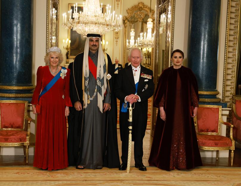 The Emir of the State of Qatar, His Highness Sheikh Tamim bin Hamad Al Thani, accompanied by Her Highness Sheikha Jawaher bint Hamad bin Suhaim Al Thani pose for a photograph with King Charles III and Queen Camilla at the state banquet.