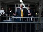 Donald Trump, standing with defense attorney Todd Blanche, speaks at his criminal trial in Manhattan on May 29. 