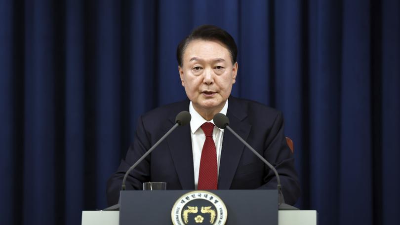 South Korean President Yoon Suk Yeol speaks during a press briefing at the presidential office in Seoul, South Korea, Tuesday, Dec. 3, 2024. 