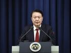 South Korean President Yoon Suk Yeol speaks during a press briefing at the presidential office in Seoul, South Korea, Tuesday, Dec. 3, 2024. 