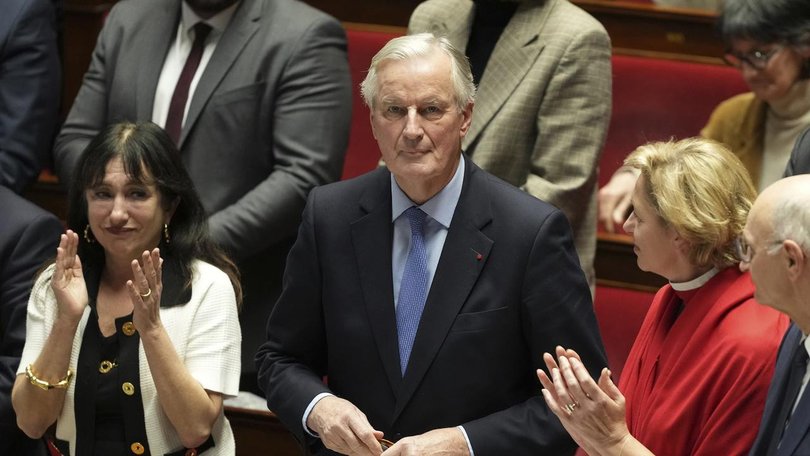 French MPs have backed a no-confidence motion that forces Prime Minister Michel Barnier to resign. (AP PHOTO)