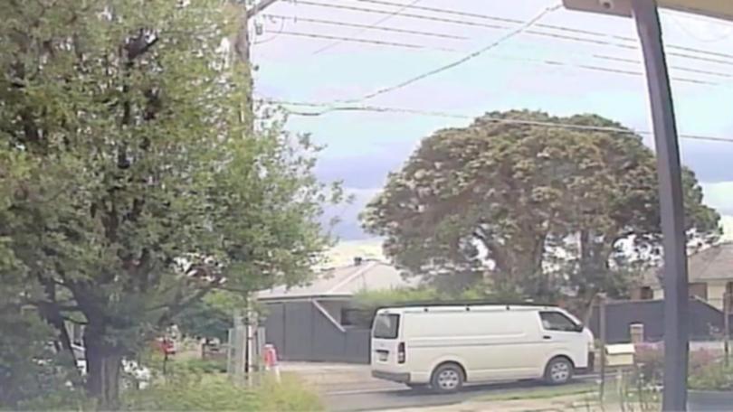 CCTV of a white van seen around Tullamarine that police are trying to locate.
