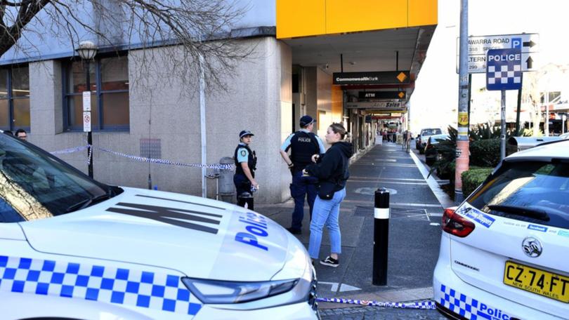 Two men were shot in a busy main street of Sydney's inner-west during a targeted attack. (Bianca De Marchi/AAP PHOTOS)
